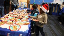 RE/MAX throws pizza party for Joliet Boys and Girls Club