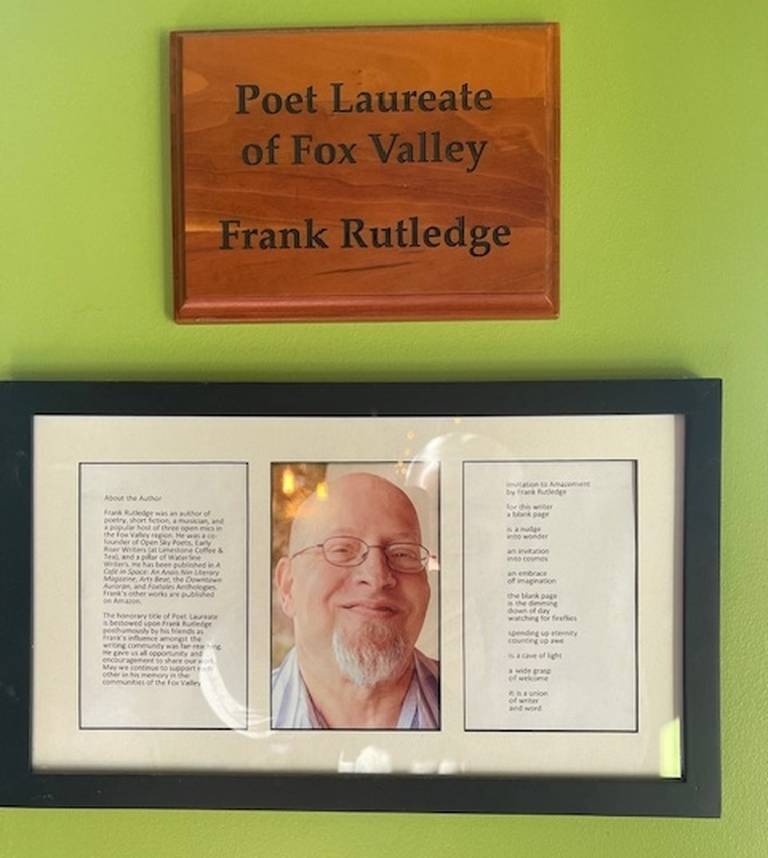 Plaque and photo of Frank Rutledge inside Limestone Coffee & Tea in Batavia. (for Rick Holinger column)