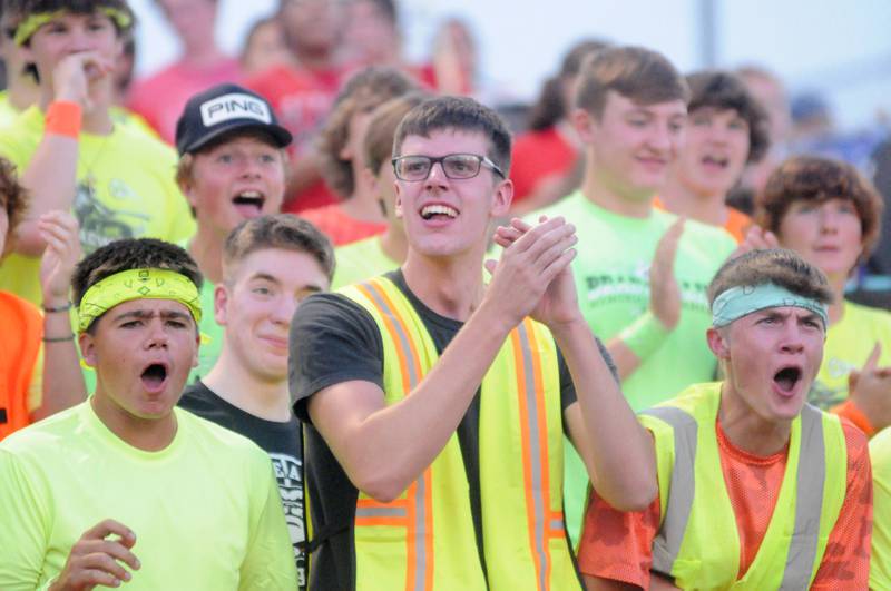 Fans cheer during the game against East Peoria at Deiken Stadium on Friday, Aug. 25, 2023.