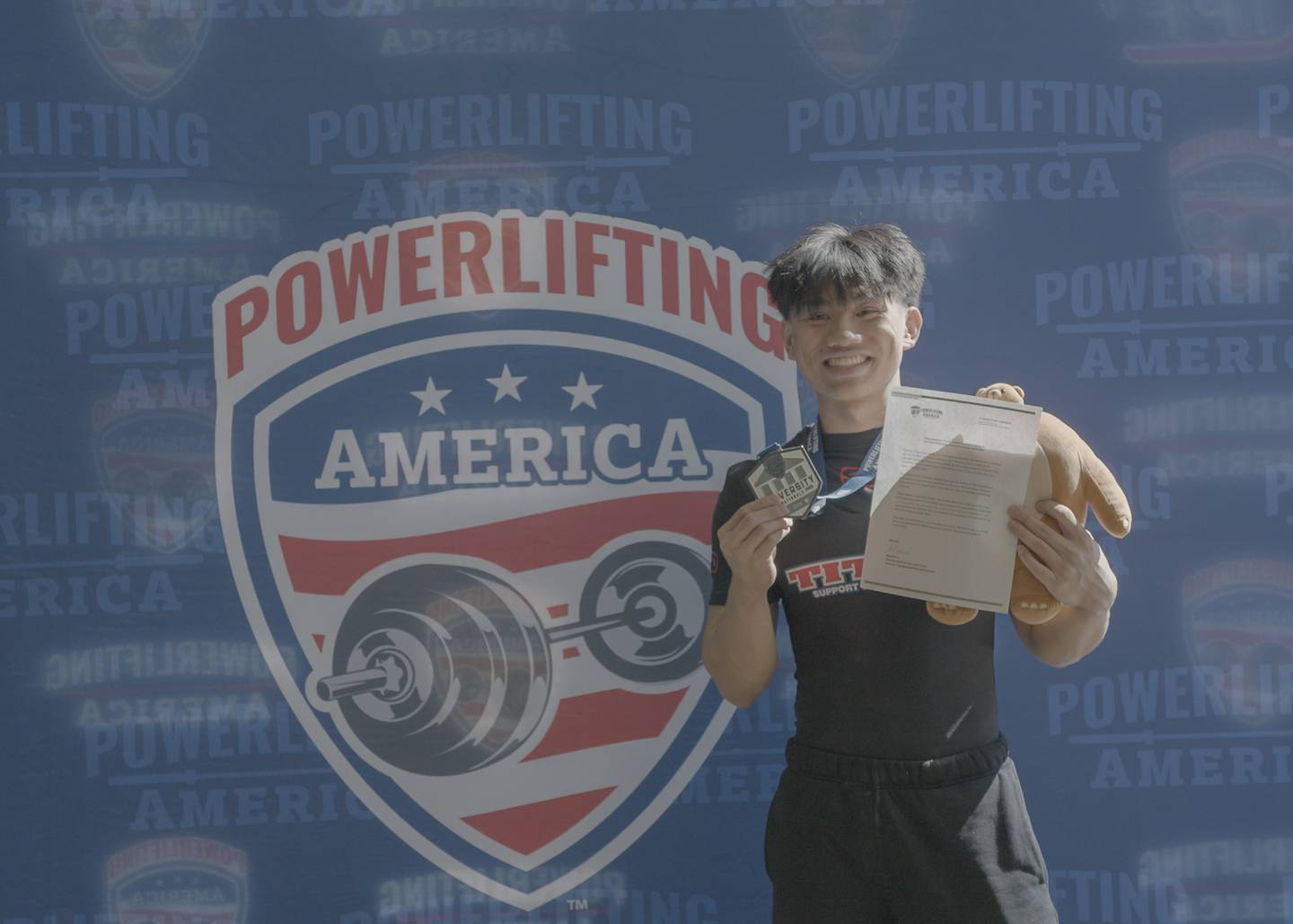 Andy Cabindol holding his 2nd place medal and official invite to Team USA.