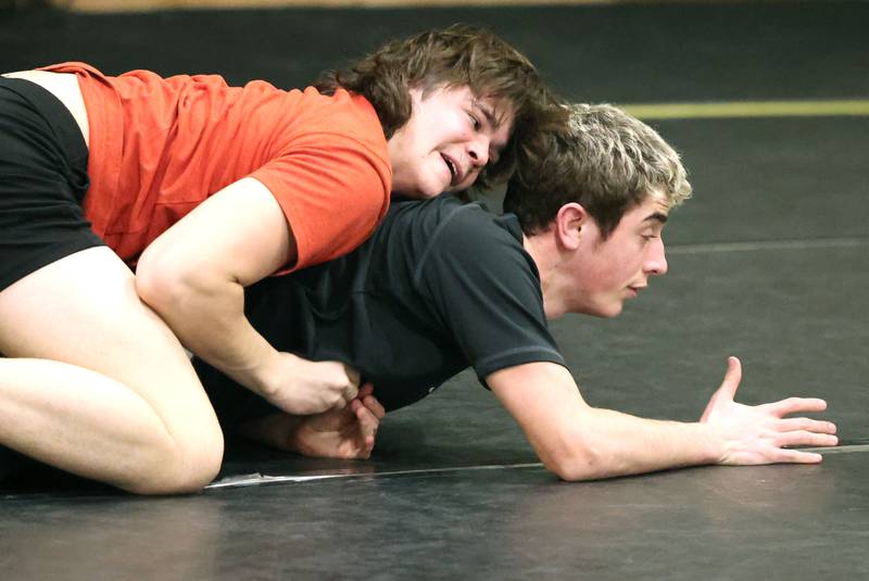 Sycamore wrestler Gabriel Crome (top) works with teammate Jaden Cochran Tuesday, Jan. 31, 2023, during practice at Sycamore High School.