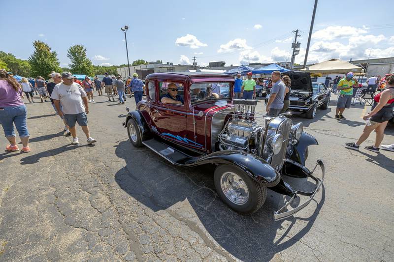A hot rod hits the road Sunday, August 27, 2023 after being on display in Amboy.