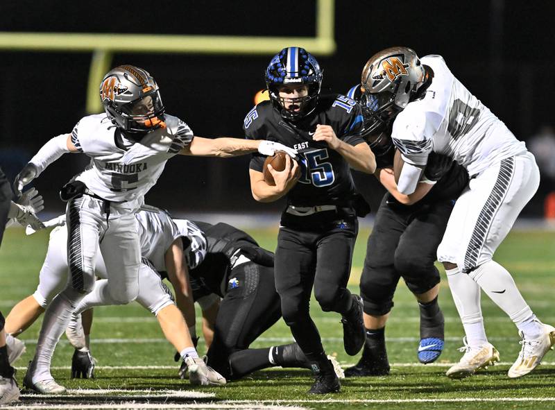 Lincoln-Way East's quarterback Braden Tischer runs the ball during the class 8A second round playoff game against Minooka on Friday, Nov. 03, 2023, at Franfort. (Dean Reid for Shaw Local News Network)