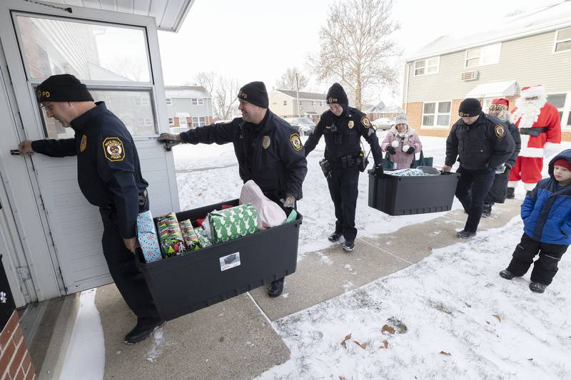 RFPD makes the second stop of the day during Operation Santa Saturday, Dec. 24, 2022. The weather prevented the department from delivering the gifts Friday afternoon.