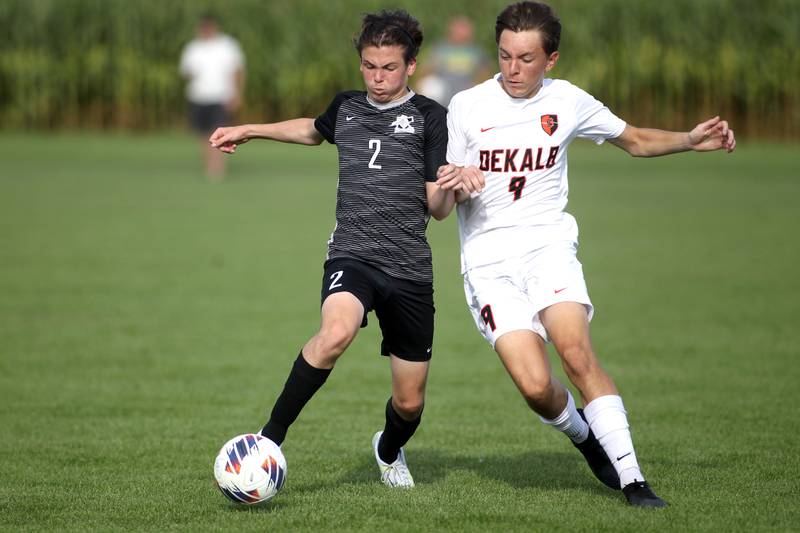 Kaneland’s Cameron Guernon (2) and DeKalb’s Seth Hess go after the ball during a game in Maple Park on Thursday, Sept. 1, 2022.