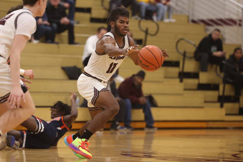 Lockport’s Jalen Falcon gets the steal against Oswego.