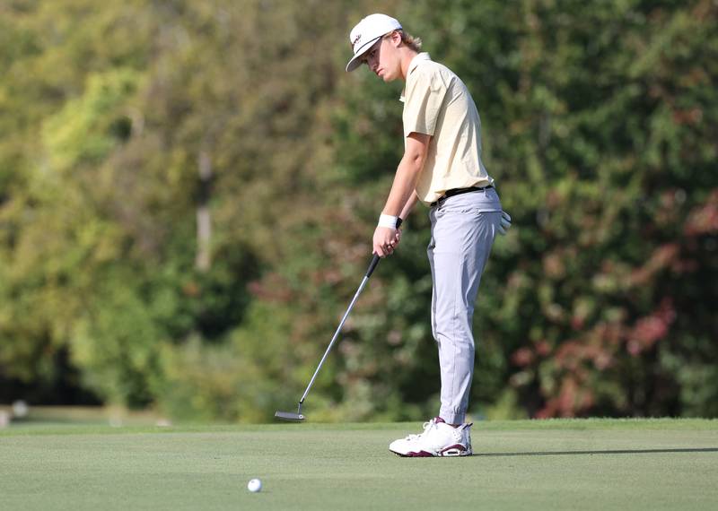 Morris’ Liam Eber putts on the third hole Monday, Sept. 23, 2024, during the Interstate 8 boys golf tournament at the Kishwaukee Country Club in DeKalb.
