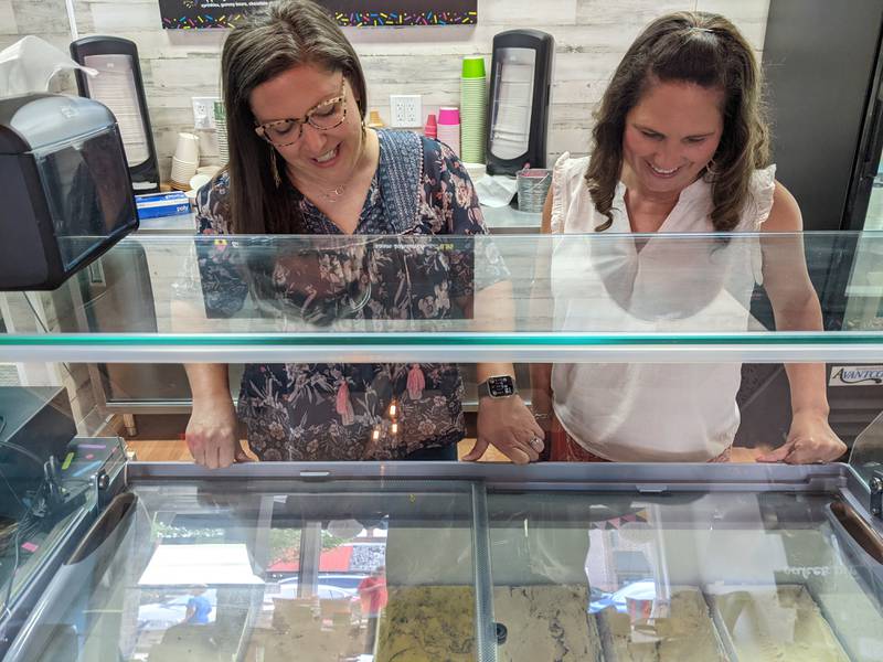 Kelley Rice, left, co-owns The Scoop with Christina Reynolds, right. The Scoop opened in downtown Oswego in May.