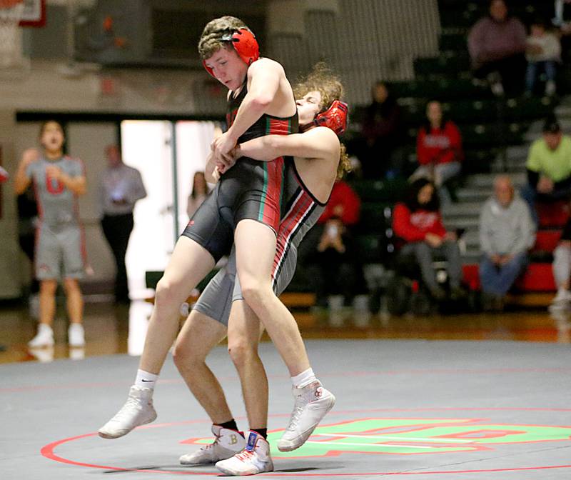 Ottawa's Sebastian Cabrera wrestles L-P's Josh Bickford in the 152 weight match during a wrestling meet in Sellett Gymnasium on Wednesday Dec. 7, 2022 at L-P High School.