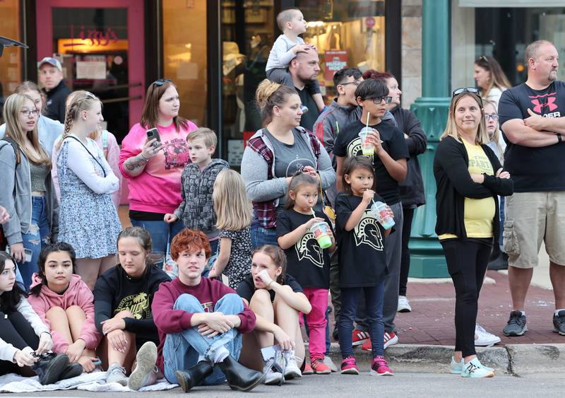 Parade attendees line State Street in downtown Sycamore Wednesday, Oct. 5, 2022, for the Sycamore High School homecoming parade.