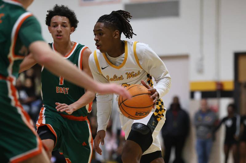 Joliet West’s Aamir Shannon makes a move to the paint against Plainfield East on Friday, Dec. 19, 2025 in Joliet.