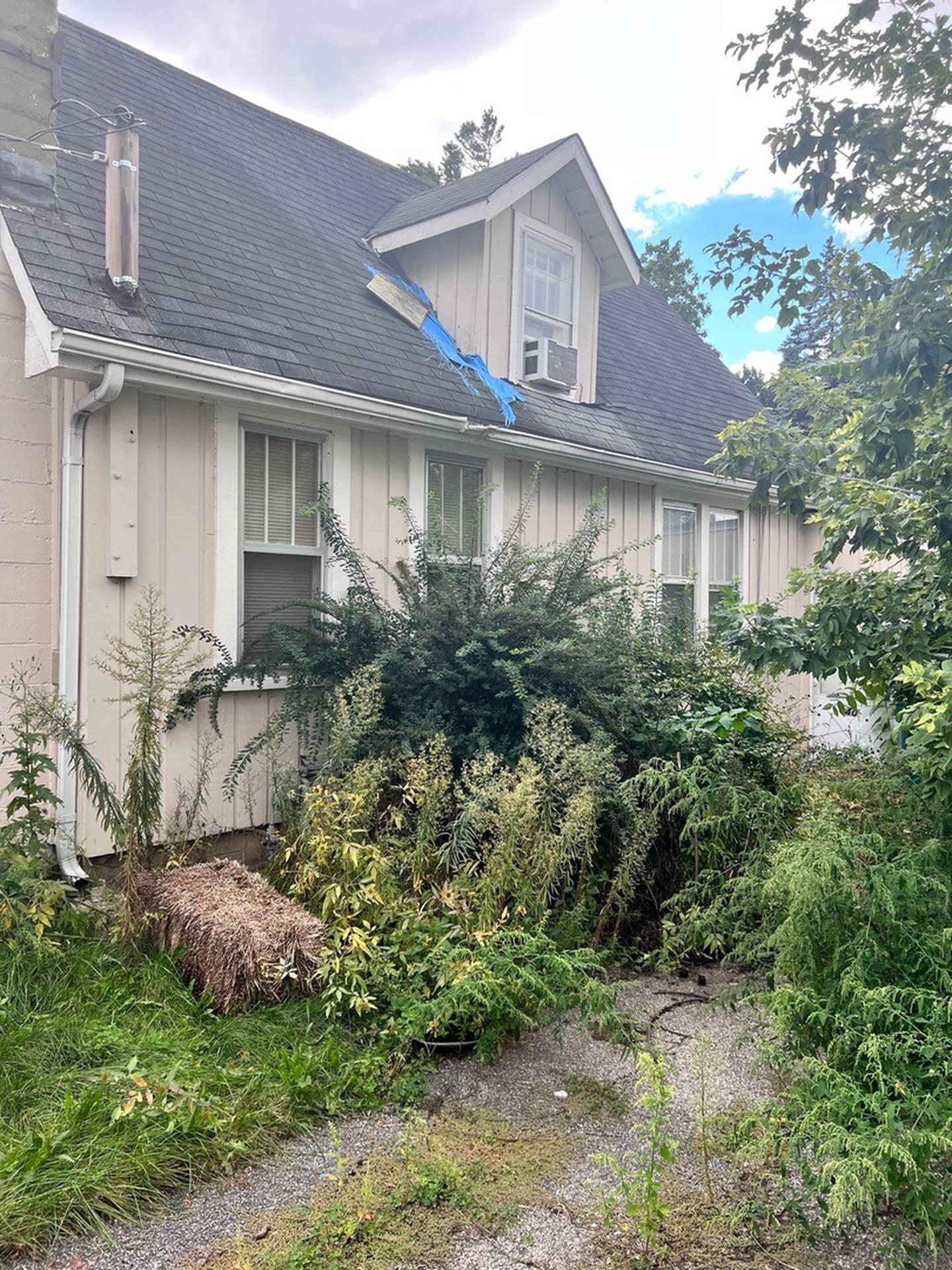 Tara Farnsworth and Bob Albrecht of Antioch, HomeVestors of America, Inc., franchisees, flipped this home on Lippincott Road in Fox Lake, winning them the 2024 Ugliest House Of The Year award from the company.