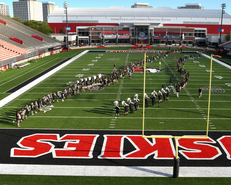 Northern Illinois University’s marching band plays for participants in the DeKalb Corn Classic 5K/10K races held on Sunday, Sept. 29, 2024. Runners went through Huskie Stadium and downtown DeKalb.