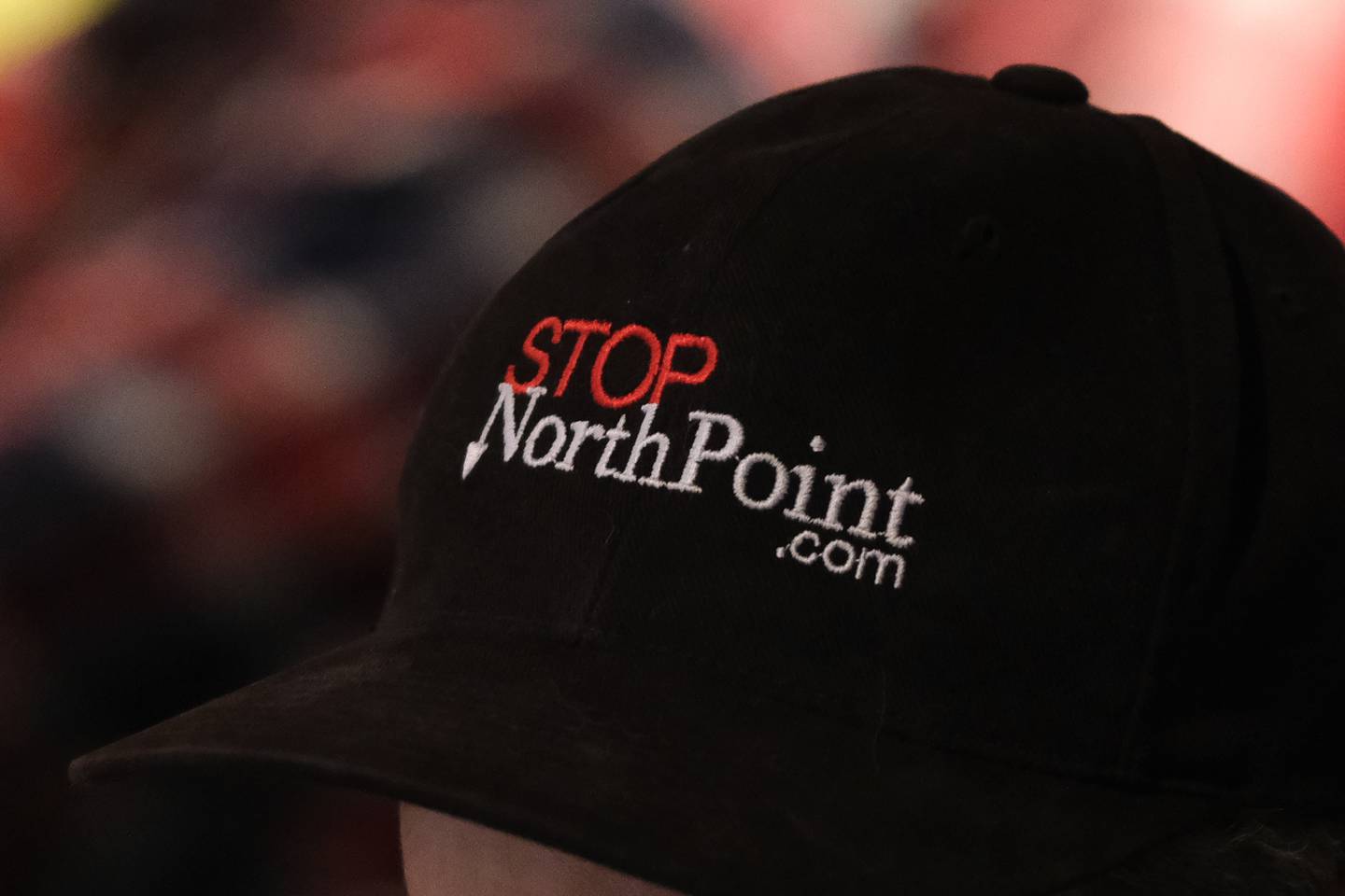 An audience member wears a Stop NorthPoint hat during the Joliet Plan Commission meeting regarding NorthPoint's development of the Compass Business Park. Thursday, Nov.18, 2021 in Joliet.