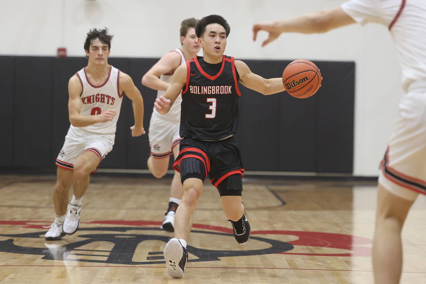 Bolingbrook’s Josh Aniceto work the ball upcourt against Lincoln-Way Central.