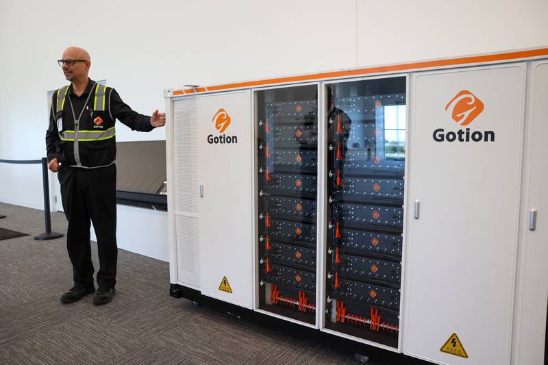Mark Kreusel, Gotion Illinois’ vice president of manufacturing and general manager at Manteno, talks about the components in an energy storage system during a tour on Oct. 1, 2025.