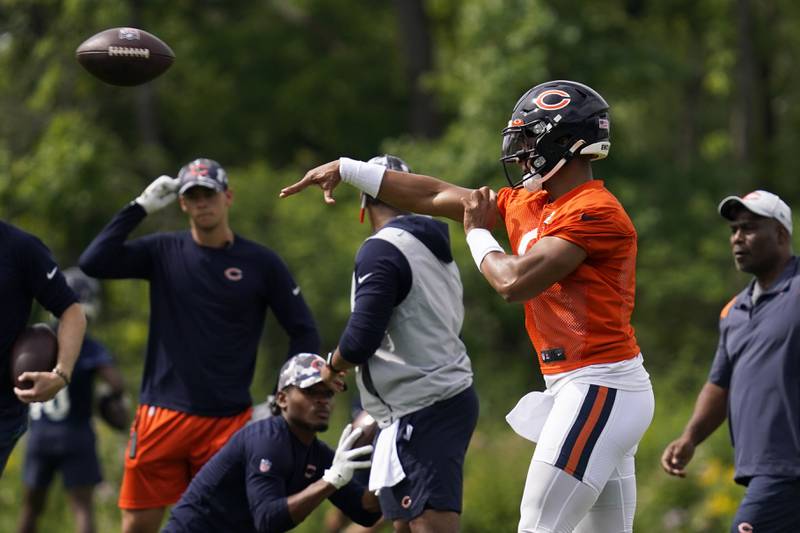 Chicago Bears quarterback Justin Fields throws a pass, Thursday, July 28, 2022, at Halas Hall in Lake Forest.