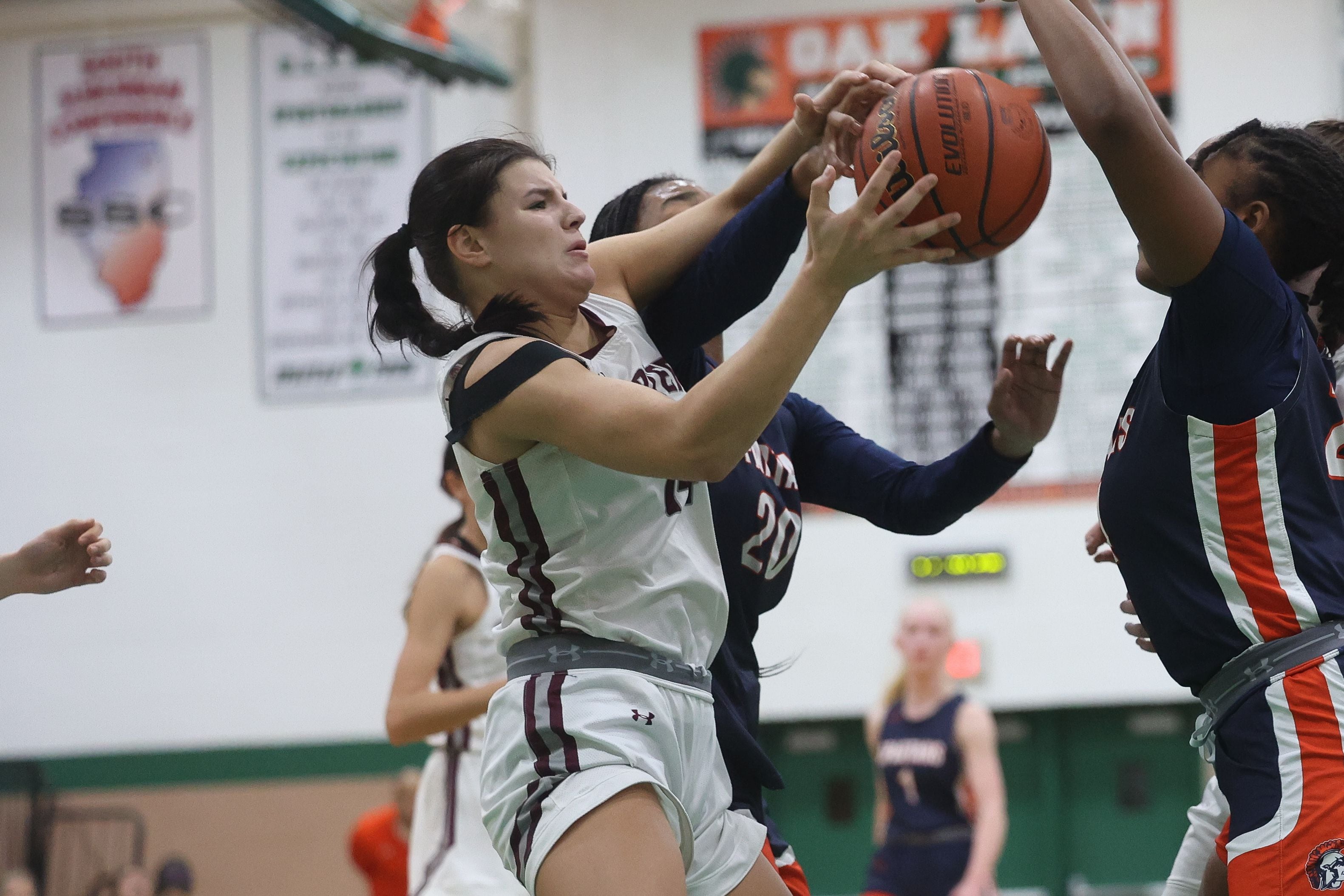 Lockport’s Veronica Bafia battles for the rebound against Romeoville in the Oak Lawn Holiday Tournament championship on Saturday, Dec.16th in Oak Lawn.