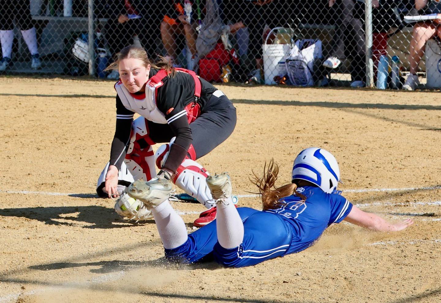 Princeton's Payton Harden slides home with the Tigresses' first run of the game in Friday''s regional semifinals at Prather Field. The Tigresses beat Sandwich 9-6.
