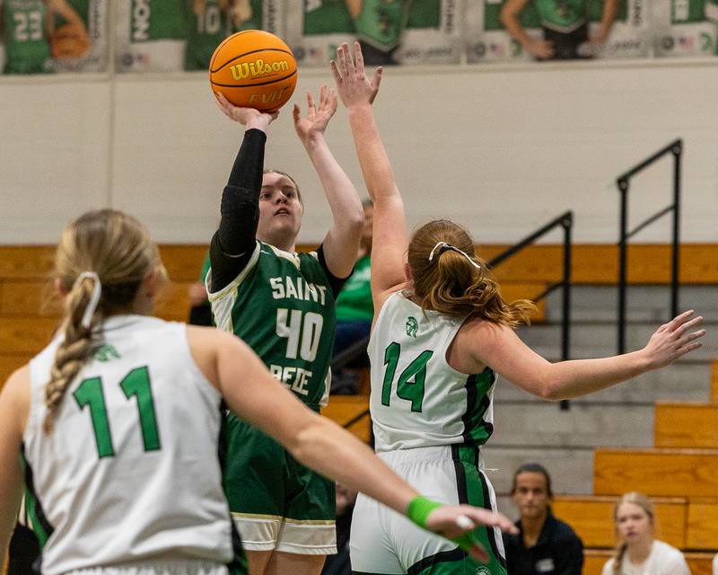 Ashlan Heersink (40) of St. Bede shoots 3-pointer over Dwight's Sophia Buck (14) on Monday, January 19, 2026 at the Krese Memorial Gymnasium in Dwight.