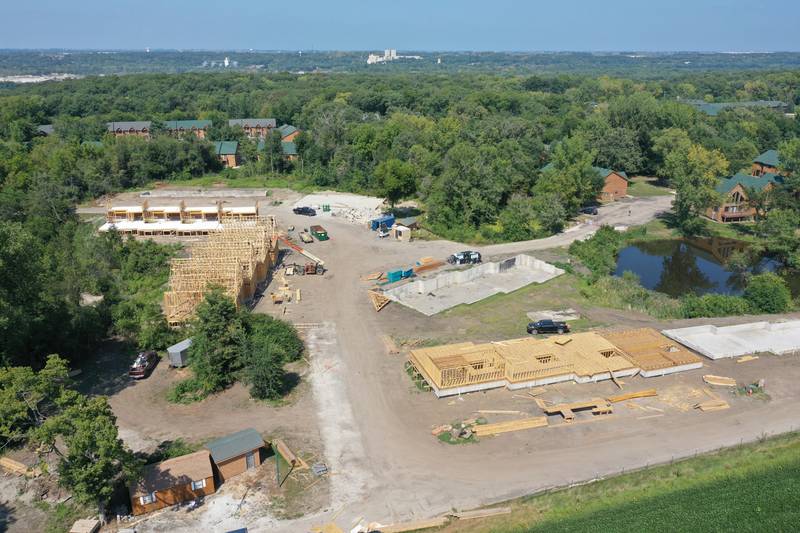 A crew builds new cabin units on Monday, Aug. 28, 2023 at Grand Bear Resort at Starved Rock in Utica. A massive fire destroyed 28 units on Memorial Day Weekend in 2022.