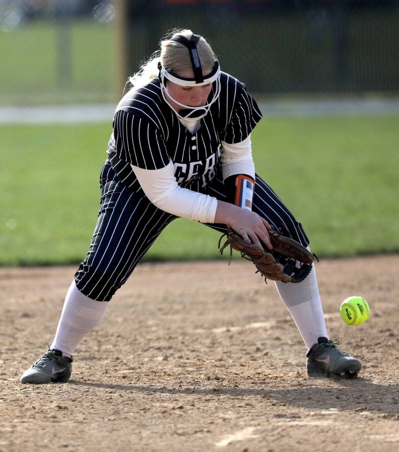 Crystal Lake Central's Logan Grams has the ball take a bad hop as she tries to field it during a Fox Valley Conference softball game against Huntley on April 7, 2026, at Crystal Lake Central High School.