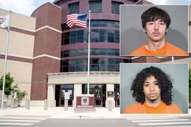 2 jailed after man allegedly pointed gun at person off Woodstock Square; other accused of hiding weapon 