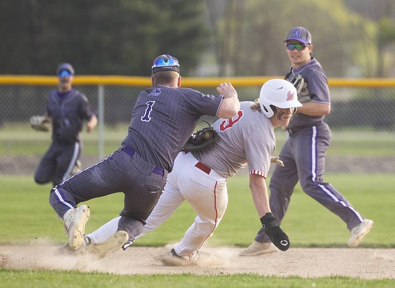 Oregon’s Zandyr Withers is tagged out by Dixon’s Jake Whelan after getting into a rundown Thursday, April 23, 2026.