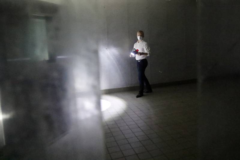 Sean Stofer, COO of Green Data Center Real Estate, Inc., walks through a huge walk-in cooler on the property at the former Motorola headquarters on Thursday, June 10, 2021 in Harvard.