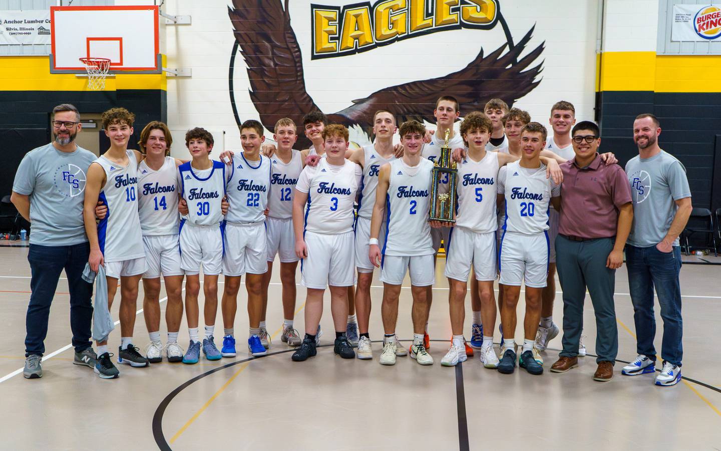 The Faith Christian boys basketball team is pictured after winning the Northern Illinois Christian Conference title on Saturday, Feb. 14. The Falcons beat Quad Cities Christian 77-41 to wrap up the regular season.