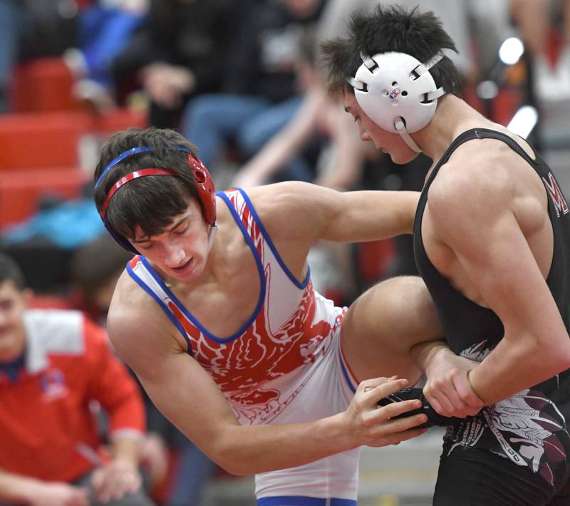 Marengo's Mitchell Aukes holds the leg of Oregon's Nelson Benesh as they wrestle in the 138 championship match at the Stillman Valley Holiday Tournament on Saturday, Dec. 20, 2025 at Stillman Valley High School.