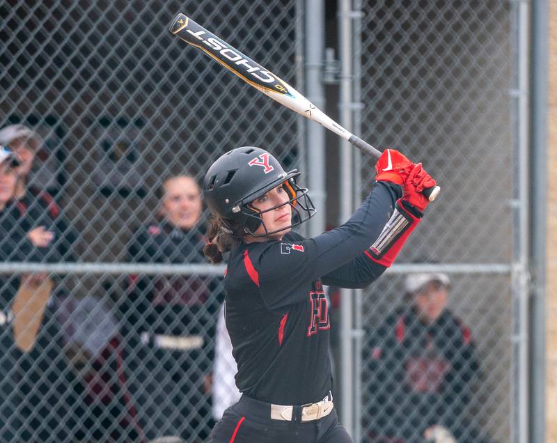 Yorkville's Samantha Davidowski (7) singles against Neuqua Valley during a softball game at Yorkville High School on Wednesday, April 6, 2022.