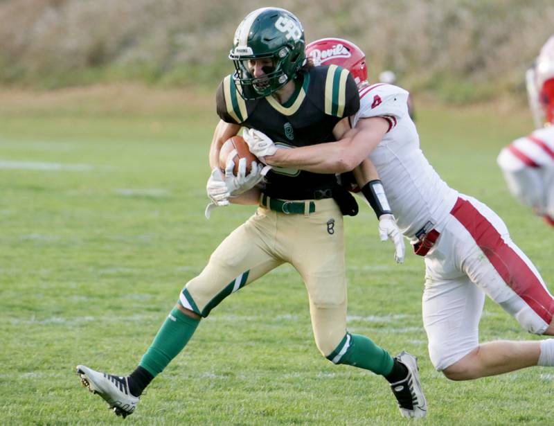 St. Bede's Thomas Makransky (6) is brought down from behined by Hall's Mac Resetich (4) on Saturday, Oct. 15, 2022 at the Academy in Peru.