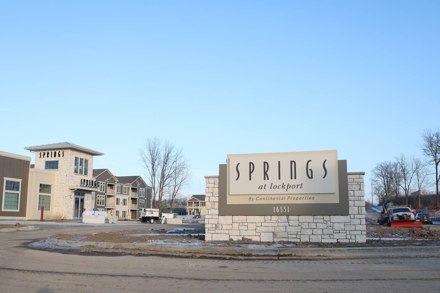 Development of The Springs at Lockport housing complex nears completion along West 159th Street near the Interstate 355 interchange in Lockport on Thursday, Jan 9, 2025. The development is described as "a premiere townhome-style living."