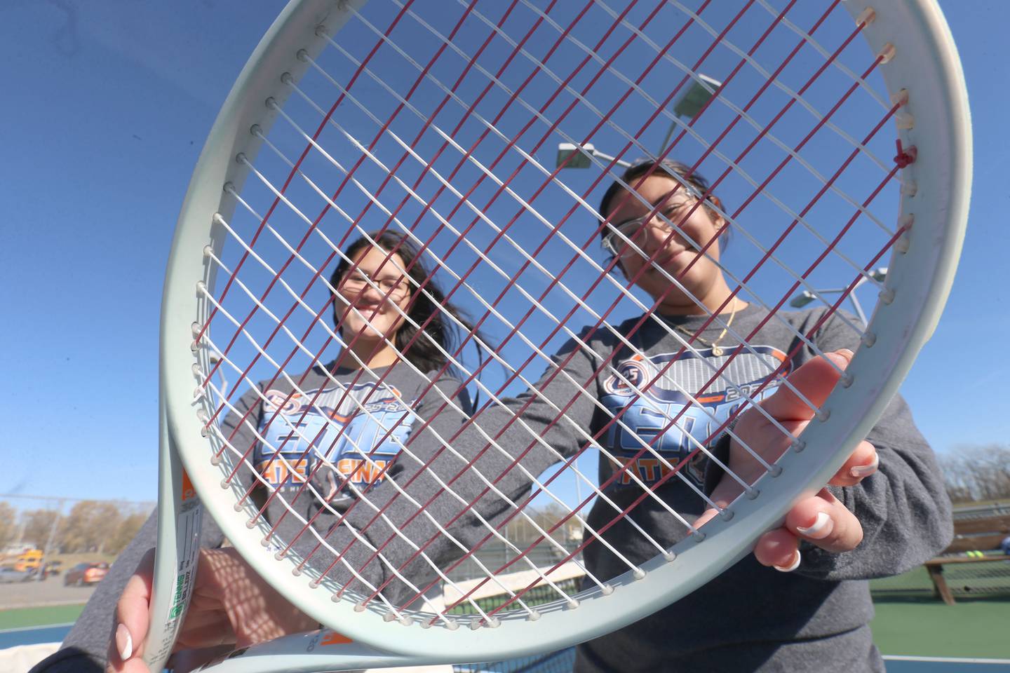 Ottawa's Zulee Morland and Yaquelin Hernandez-Solis pose for a photo on Wednesday, Nov. 12, 2025 at the Henderson-Guenther Tennis Facility at Ottawa High School. The pair are the 2025 Ottawa Times girls tennis players of the year.
