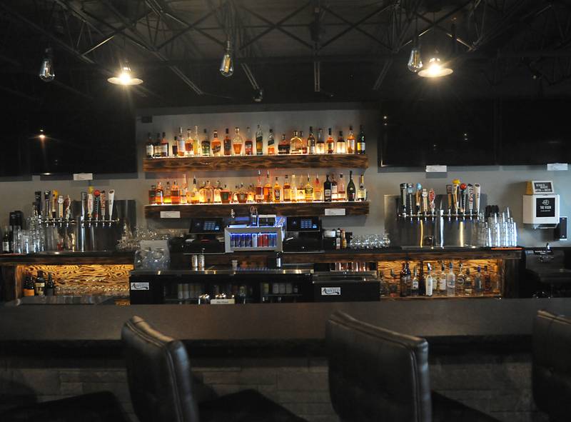 The remodeled bar area of The Vixen, at 1208 N. Green St. in McHenry, is photographed Wednesday, April 14, 2022. Formerly the McHenry Downtown Theater, it is reopening for live shows as part of the theater's pivot away from being a movie theater. As part of the renovations, the location's multiple movie theaters were combined into one large theater.