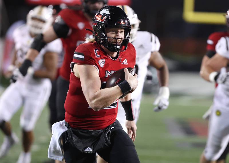 Northern Illinois' Rocky Lombardi scrambles through the Western Michigan defense near the goal line to set up a touchdown during their game Tuesday, Nov. 14, 2023, in Huskie Stadium at NIU in DeKalb.