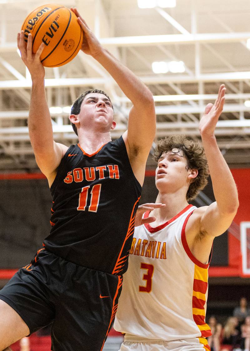Wheaton Warrenville South’s Zach Rogers goes up for a layup during an away game against Batavia on Tuesday, Jan. 7, 2025.
