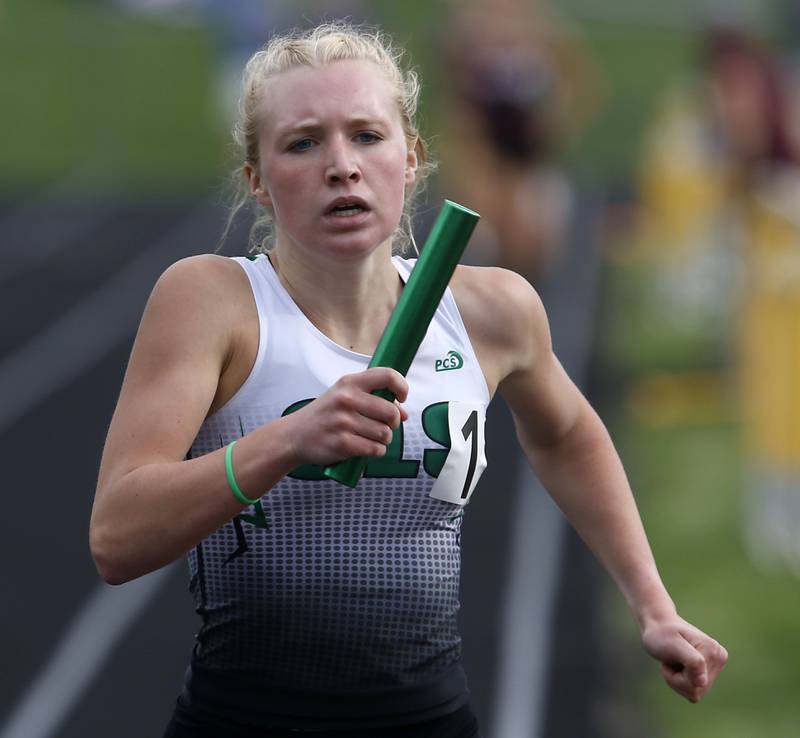 Crystal Lake South’s Abby Machesky runs the last leg of the 4 x 800 X meter relay on Thursday, May 2, 2024, during the Fox Valley Conference Girls Track and Field Meet at Jacobs High School in Algonquin.