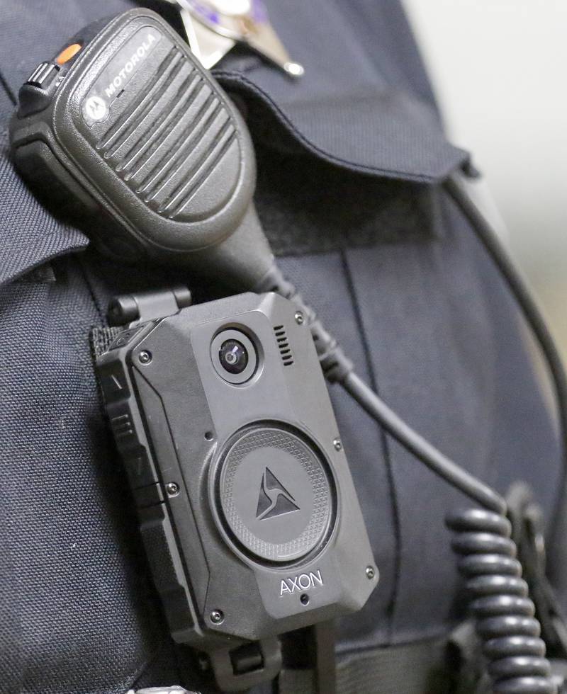 A police officer is seen with a body camera on