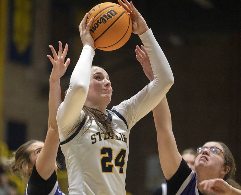 Sterling’s Madison Austin puts up a shot against Rochelle Monday, Feb. 17, 2025, during the girls 3A regional semifinal game in Sterling.