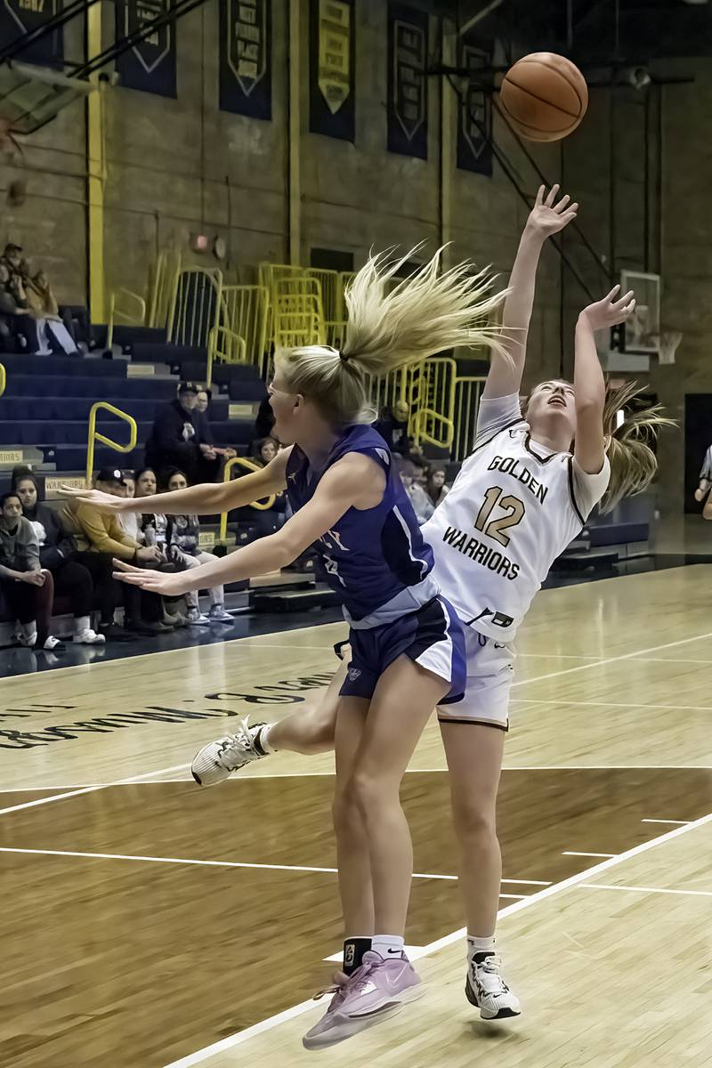 Sterling’s Olivia Melcher puts up a shot against Quincy Saturday, Jan. 28, 2023.