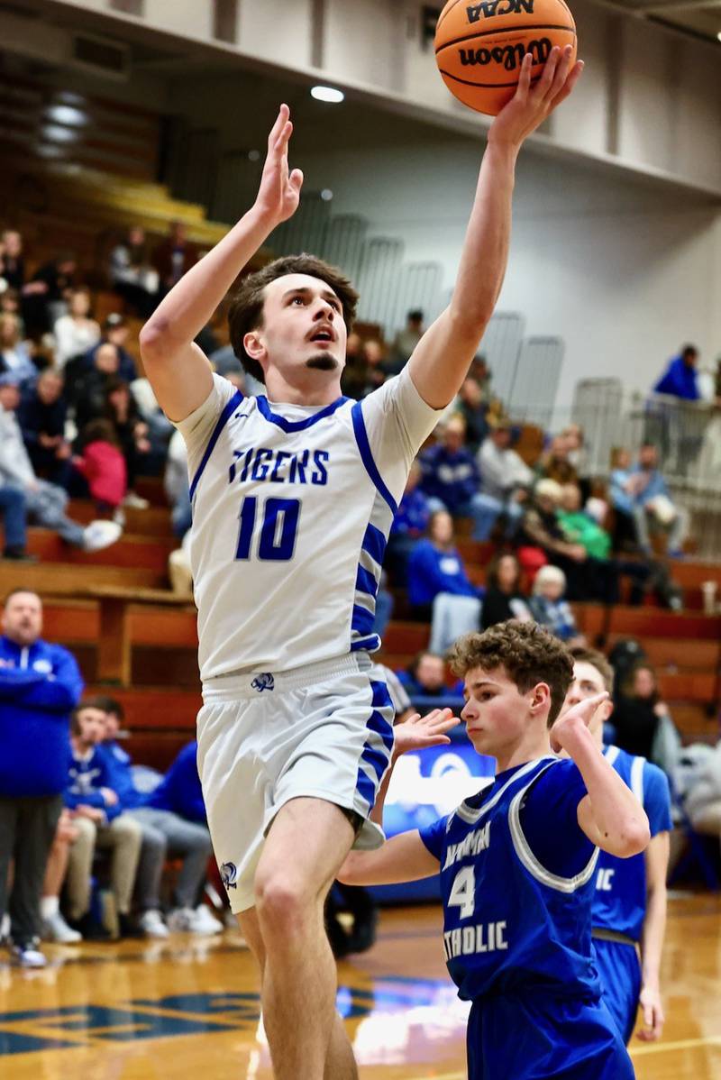 Princeton's Gavin Lanham shoots a layup against Newman Saturday night at Prouty Gym.