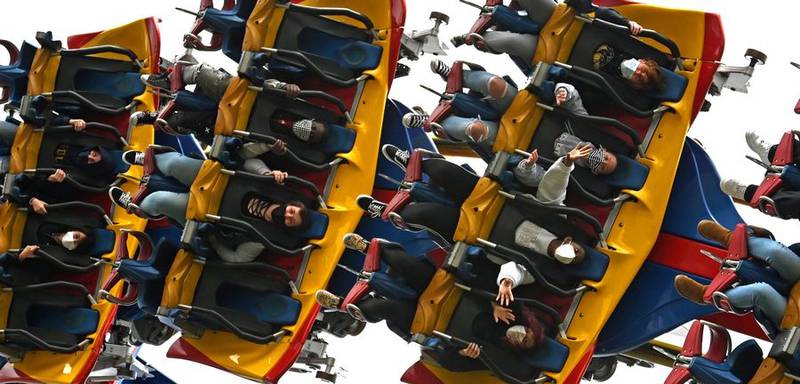Six Flags Great America visitors ride Superman Ultimate Flight on opening day in 2021.
