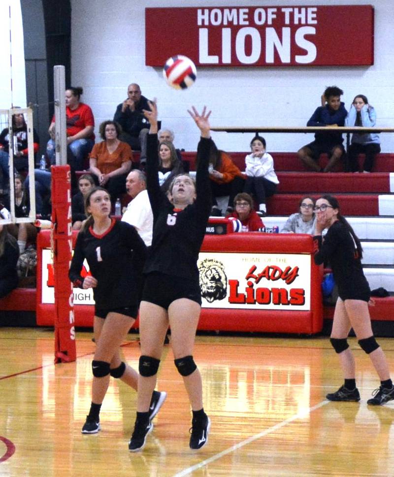 LaMoille Sadie Quest sets up the Lions on Senior Night Monday. The Lions fell 2-0 to Streator Woodland.