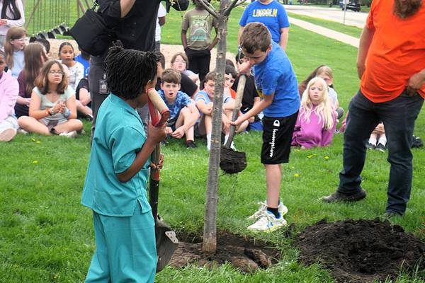 DeKalb students get some help planting a ‘Legend-ary’ new tree for Arbor Day