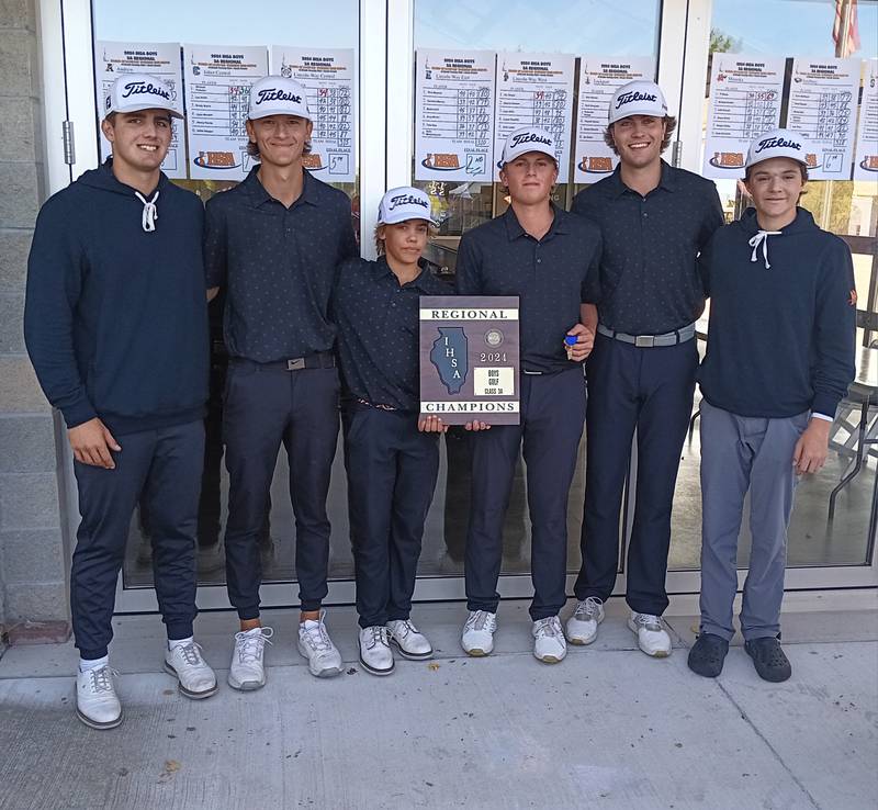 The Minooka golf team poses with the regional plaque after winning the Class 3A Lockport Regional title on Wednesday at Nettle Creek Country Club in Morris.