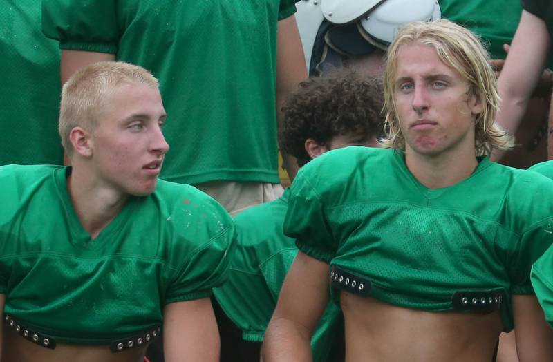 Jaron and Mason Morschieser take a knee after a joint practice on Monday July 21, 2025 at Howard Fellows Stadium.