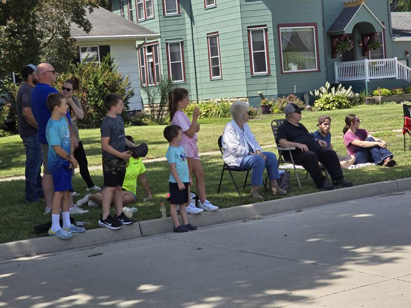 Parade goers eagerly await the start of the Wenona Days Grand Parade Sunday, Aug. 11, 2024, on Walnut Street.