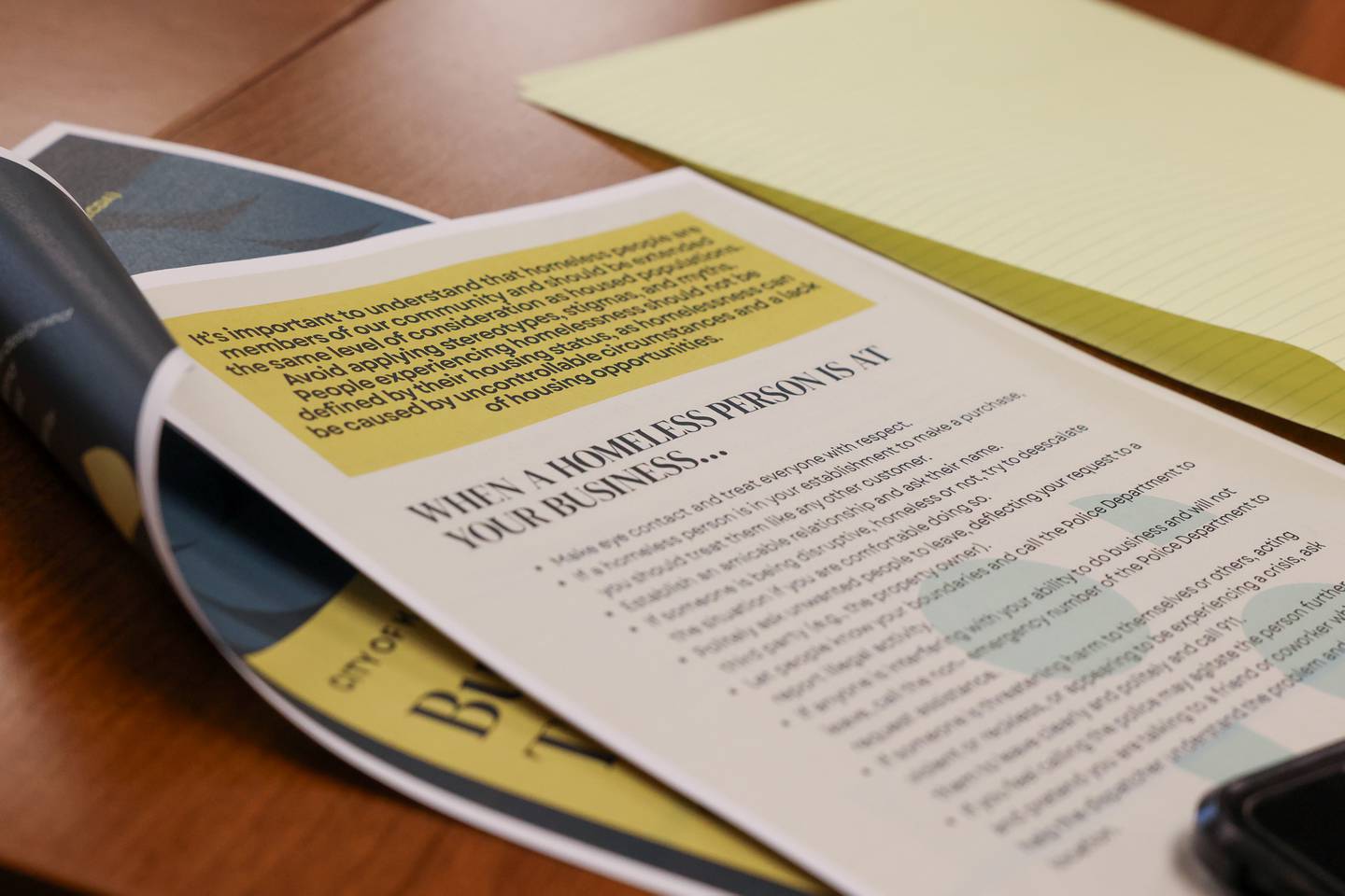 A page in the Business Toolkit for Interactions with Homeless Individuals shares tips and strategies during the first workshop on Monday, Oct. 27, 2025, at the Kankakee Public Library.